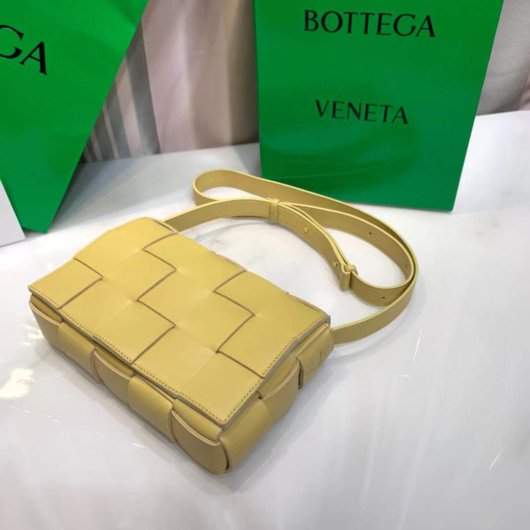 Bottega Veneta Cassette leather shoulder bag in a lemon yellow color