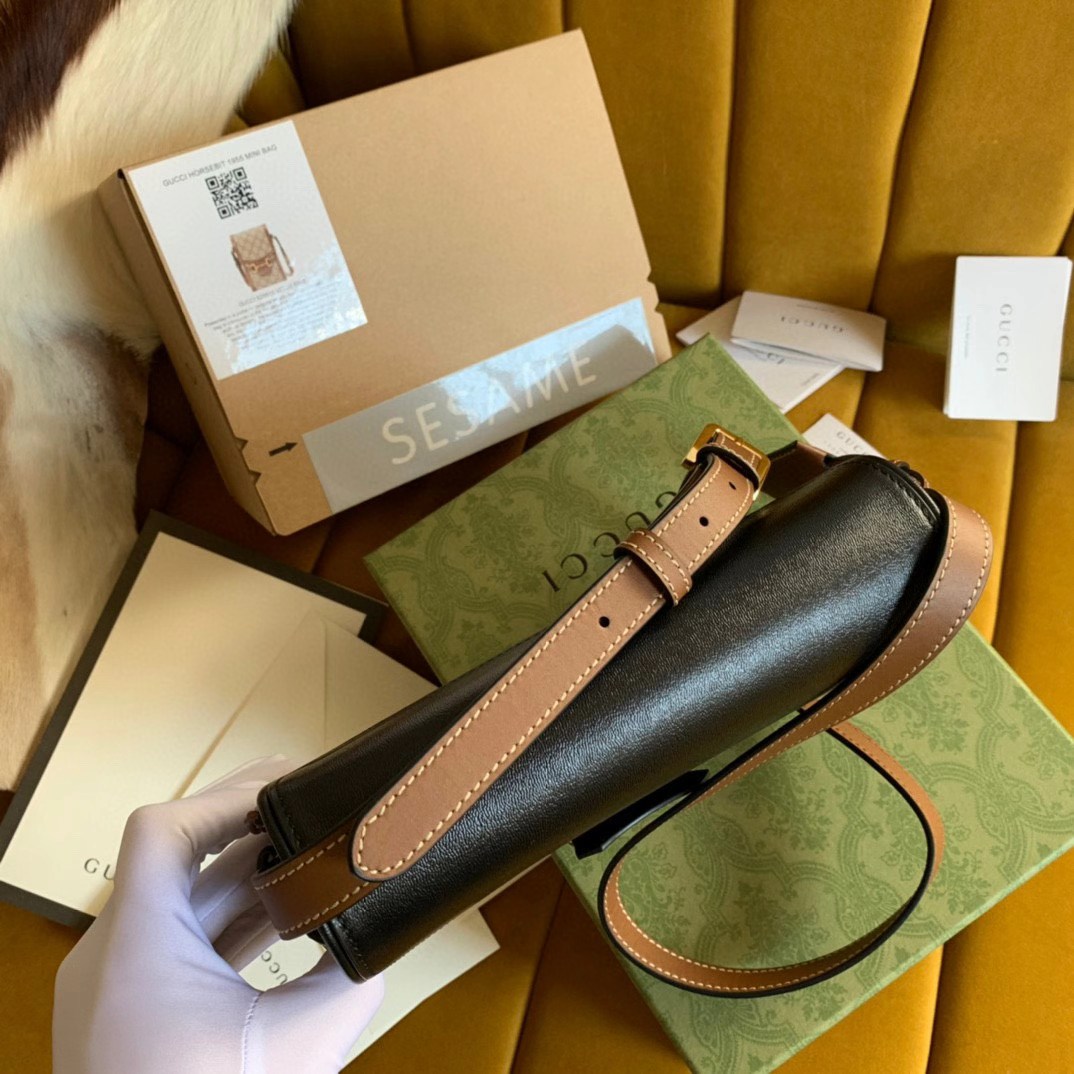 Gucci Padlock Saddle Shoulder Bag features GG Supreme canvas with black leather trim and a gold-toned padlock closure