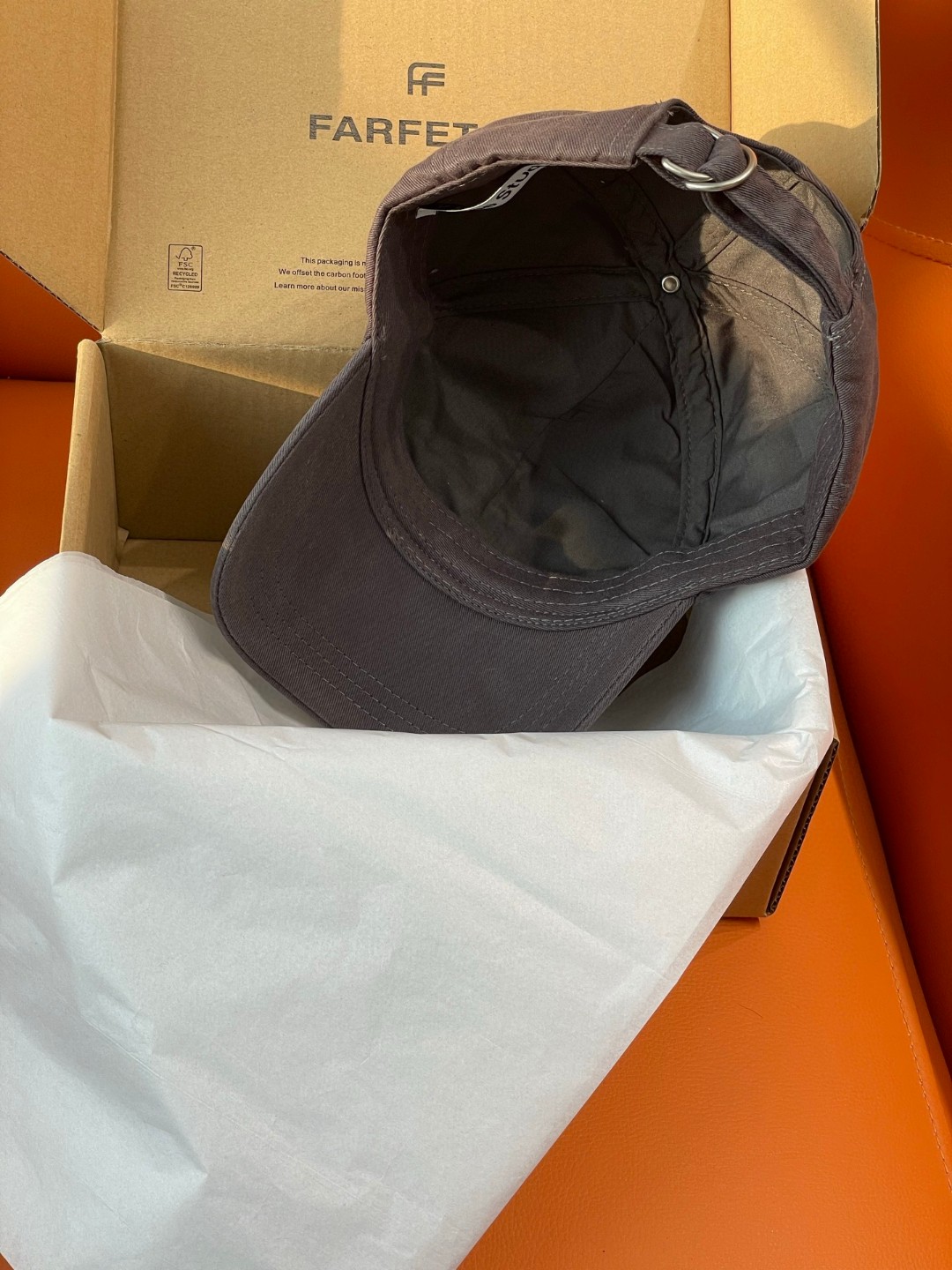 Acne Studios Stockholm 1996 cap in faded black crafted from washed cotton twill with an embroidered logo on the front panel