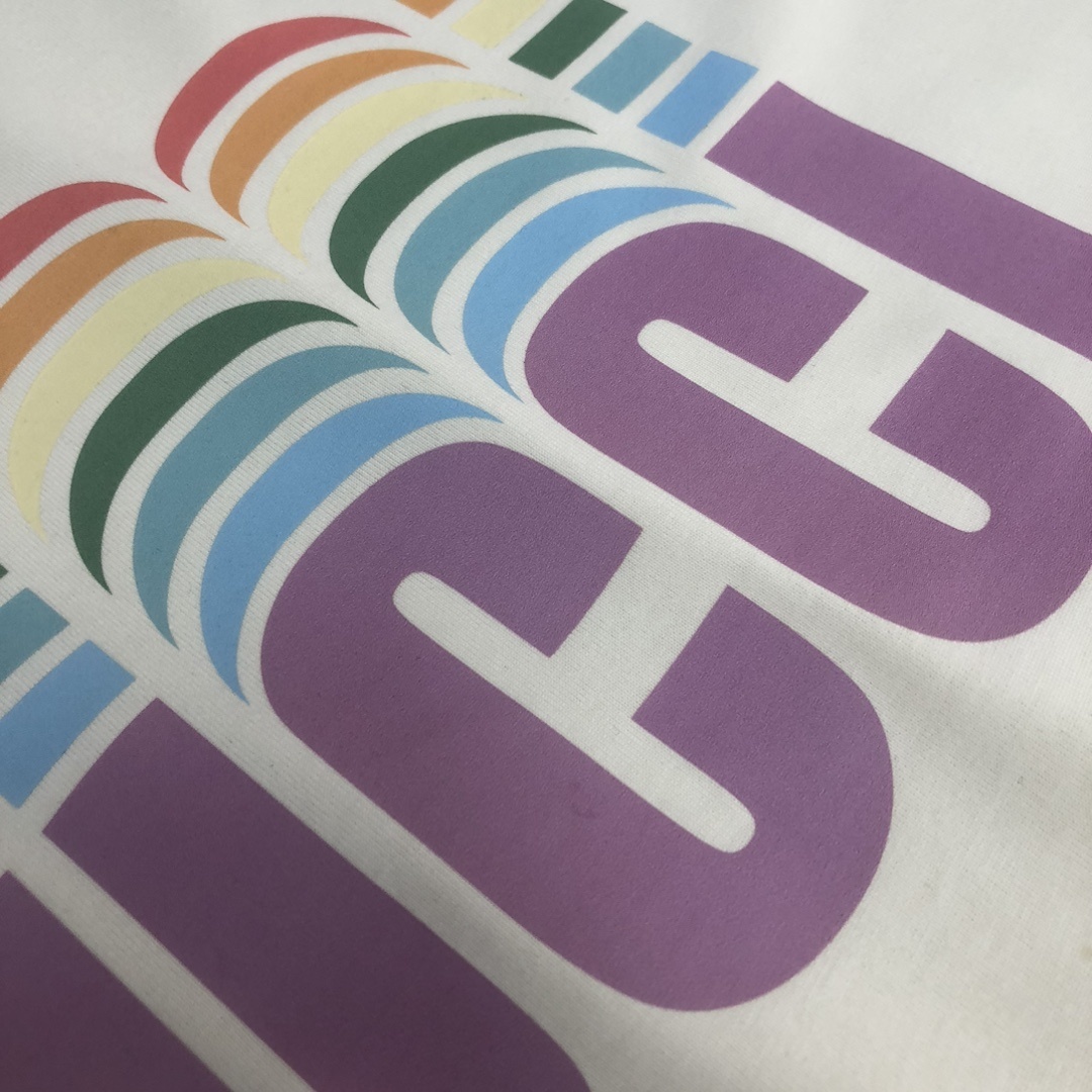 Gucci white T-shirt features a colorful, retro-inspired rainbow logo graphic