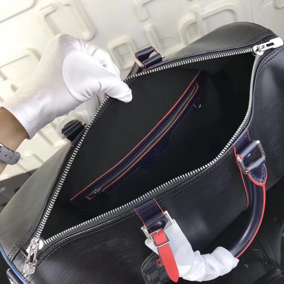 LV Keepall Bandoulière bag crafted from black Epi leather with a Damier Graphite strap.