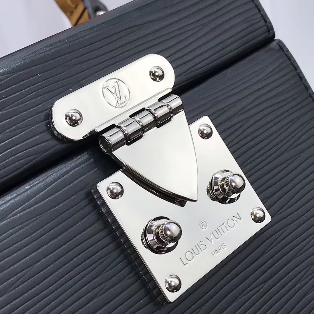 LV Bleecker Box bag is a structured vanity-style shoulder bag crafted from signature black Epi leather, featuring a top handle, silver-tone S-lock hardware, and a removable shoulder strap.