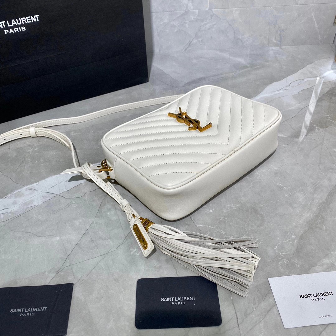 Saint Laurent Lou camera bag is crafted from white quilted leather and features the signature gold-tone YSL monogram plaque.