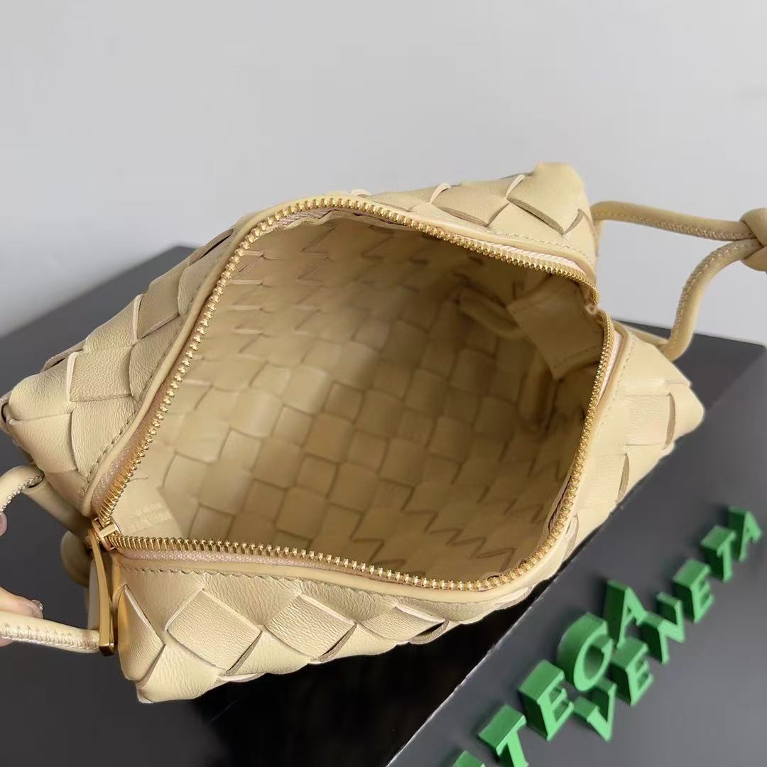 Bottega Veneta Mini Loop Camera Bag crafted from woven leather in an iconic intrecciato style