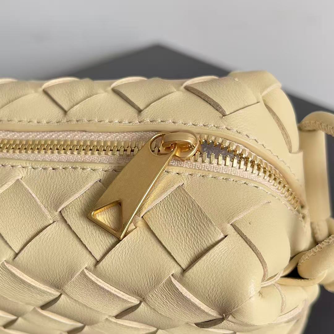 Bottega Veneta Mini Loop Camera Bag crafted from woven leather in an iconic intrecciato style