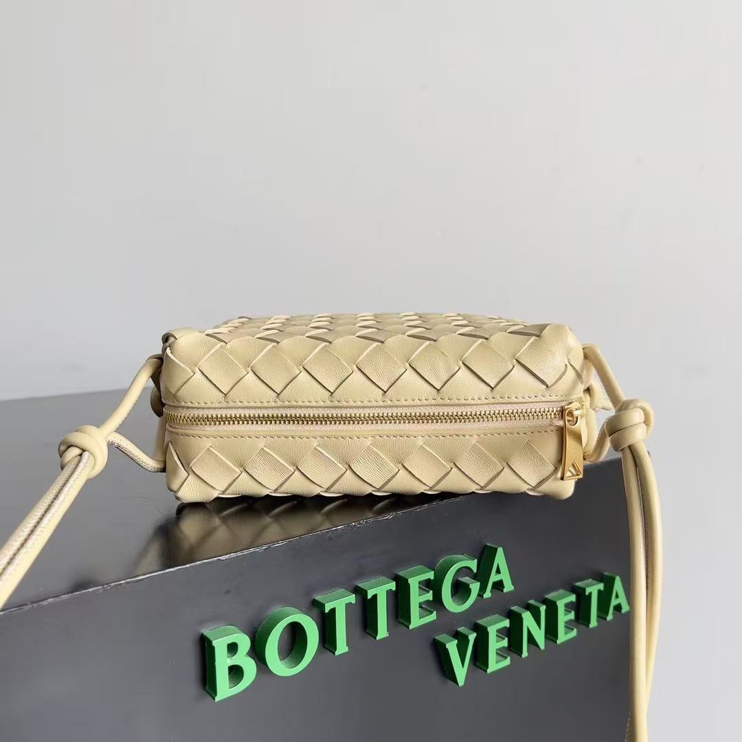 Bottega Veneta Mini Loop Camera Bag crafted from woven leather in an iconic intrecciato style