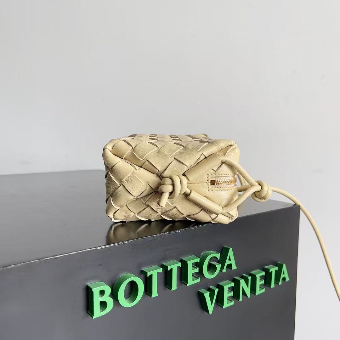 Bottega Veneta Mini Loop Camera Bag crafted from woven leather in an iconic intrecciato style