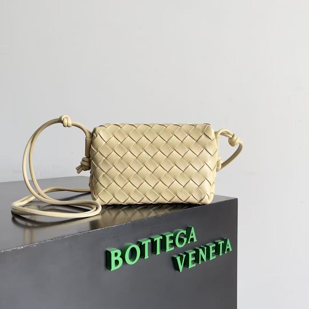 Bottega Veneta Mini Loop Camera Bag crafted from woven leather in an iconic intrecciato style