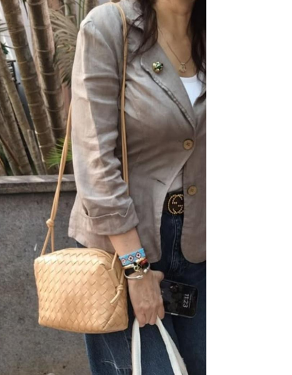 Bottega Veneta Mini Loop Camera Bag crafted from woven leather in an iconic intrecciato style