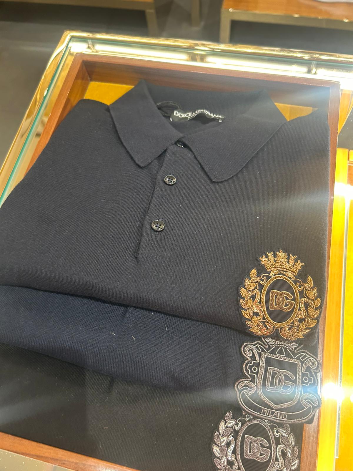 Dolce and Gabbana navy blue cotton polo shirt featuring heraldic patch embroidery