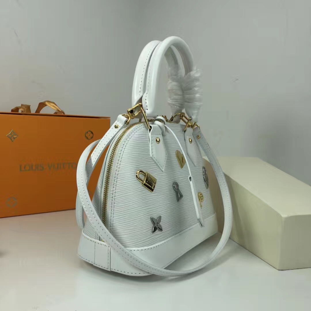 LV white Epi leather Alma BB bag from the 2016 "Love Lock" collection.