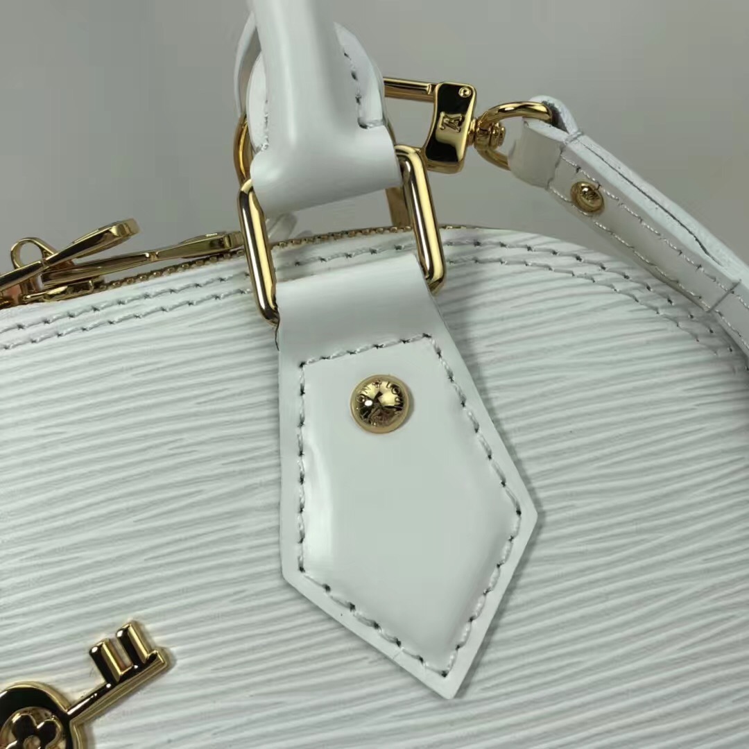LV white Epi leather Alma BB bag from the 2016 "Love Lock" collection.