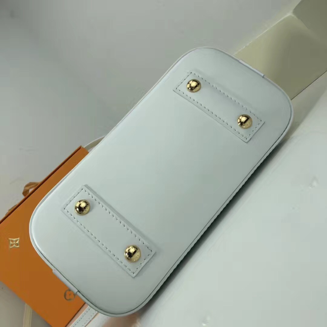LV white Epi leather Alma BB bag from the 2016 "Love Lock" collection.