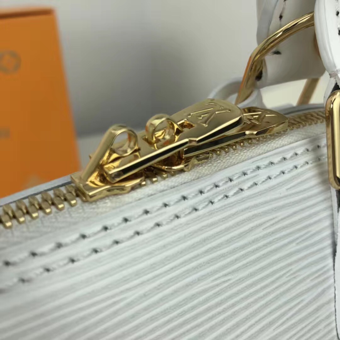 LV white Epi leather Alma BB bag from the 2016 "Love Lock" collection.