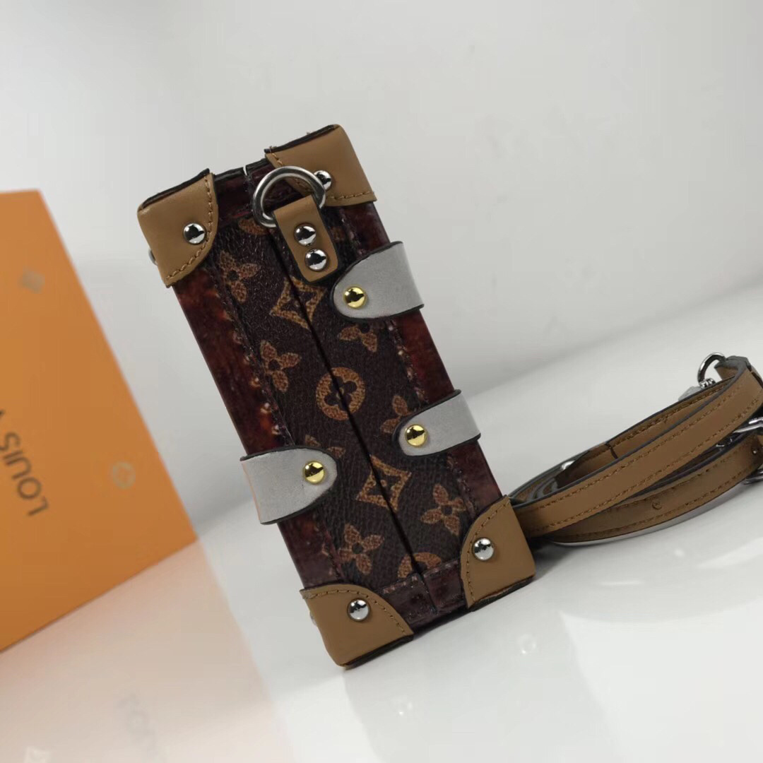 LV Petite Malle Time Trunk handbag made from transformed canvas and leather.