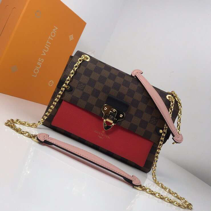 LV Vavin PM bag crafted from Damier Ebene canvas with a red leather flap and gold-tone chain strap.