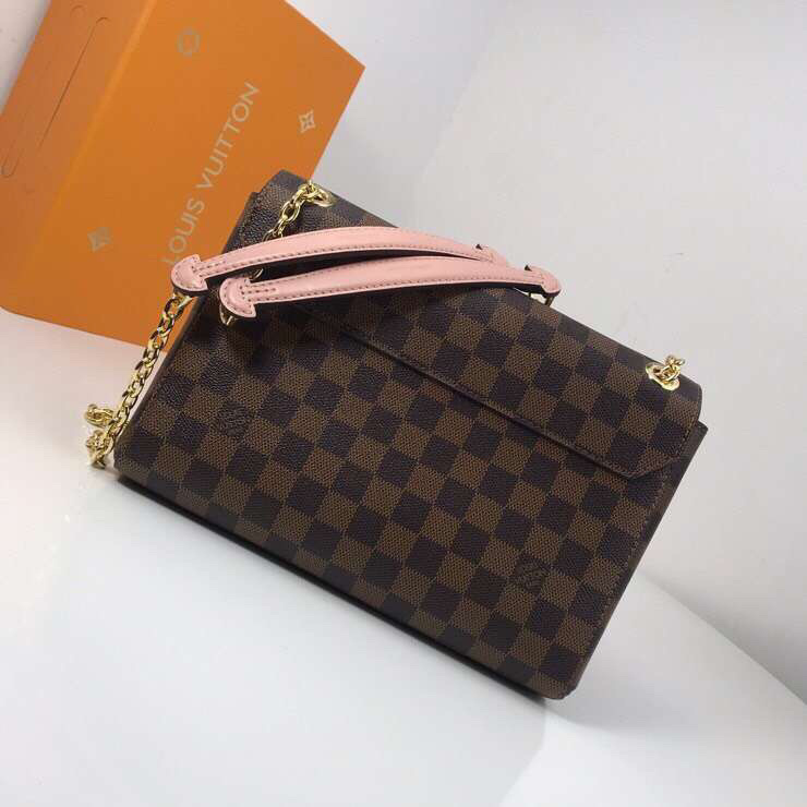 LV Vavin PM bag crafted from Damier Ebene canvas with a red leather flap and gold-tone chain strap.
