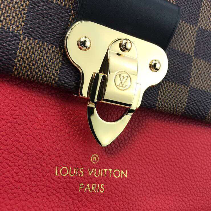 LV Vavin PM bag crafted from Damier Ebene canvas with a red leather flap and gold-tone chain strap.
