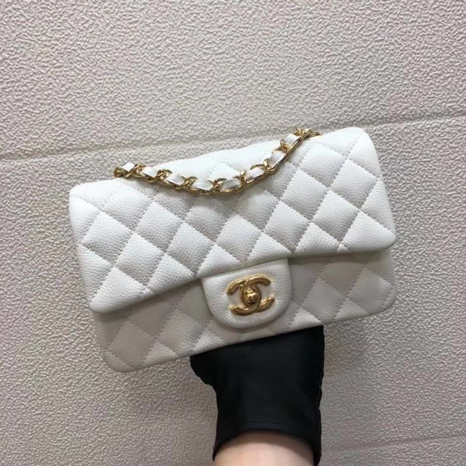 Chanel Small Classic Flap handbag in white quilted caviar leather