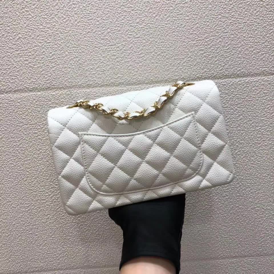 Chanel Small Classic Flap handbag in white quilted caviar leather