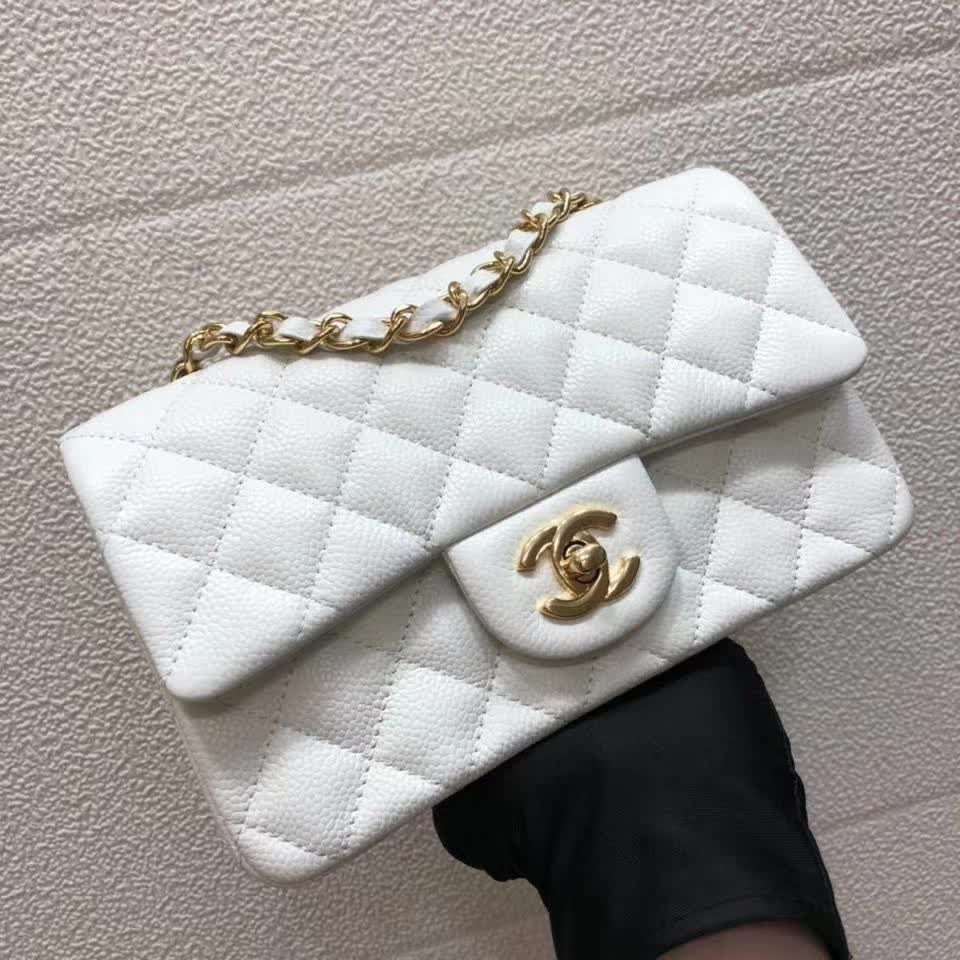 Chanel Small Classic Flap handbag in white quilted caviar leather