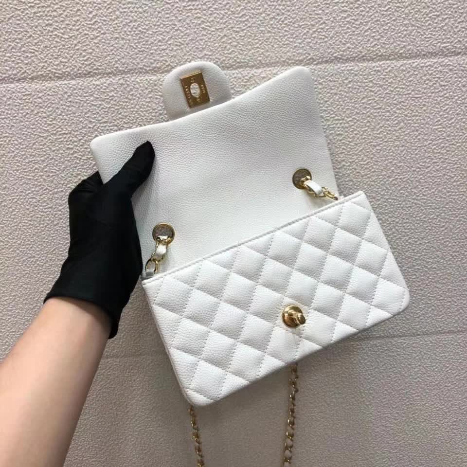 Chanel Small Classic Flap handbag in white quilted caviar leather