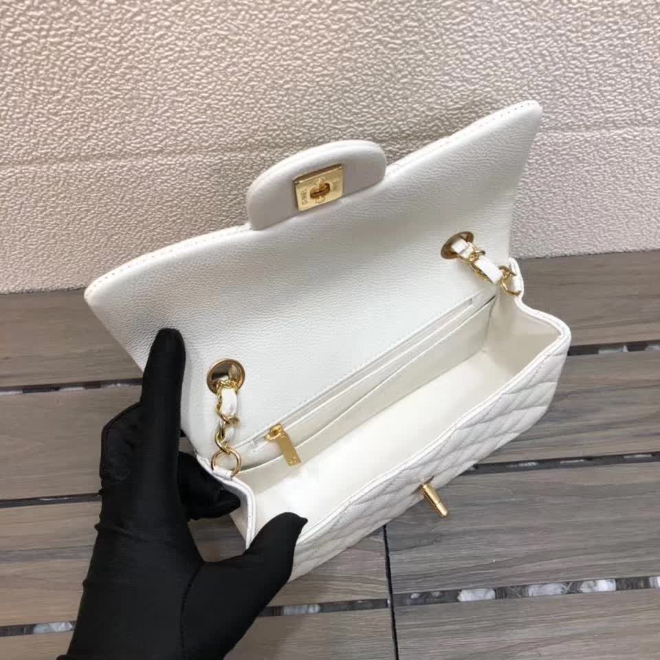 Chanel Small Classic Flap handbag in white quilted caviar leather