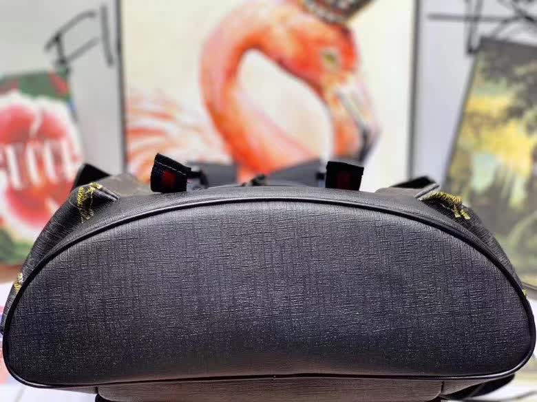 Gucci GG Supreme Backpack featuring a tiger print design.