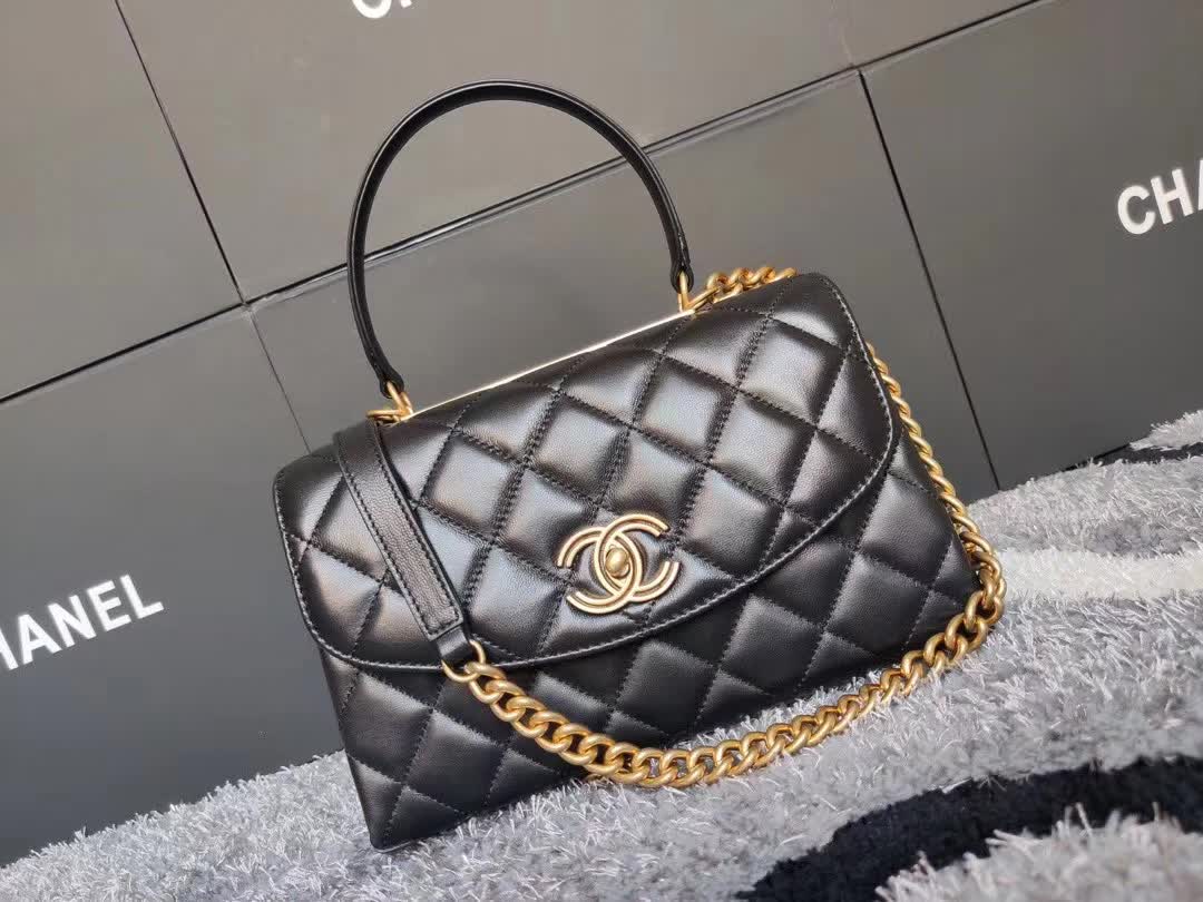 Chanel CC Trendy Top Handle Bag featuring a signature diamond quilting pattern, gold-tone CC turn-lock closure, and a structured top handle