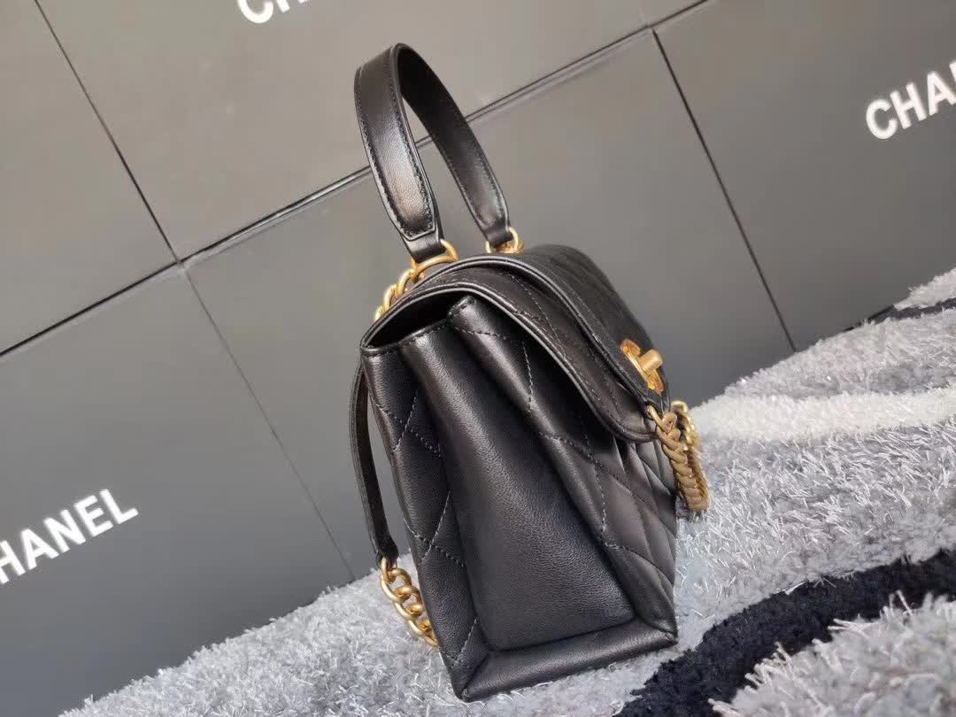 Chanel CC Trendy Top Handle Bag featuring a signature diamond quilting pattern, gold-tone CC turn-lock closure, and a structured top handle