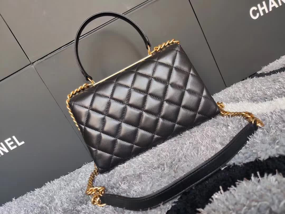 Chanel CC Trendy Top Handle Bag featuring a signature diamond quilting pattern, gold-tone CC turn-lock closure, and a structured top handle