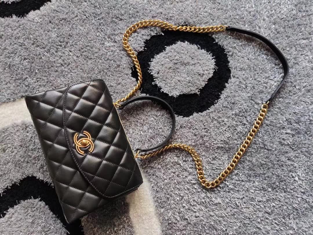 Chanel CC Trendy Top Handle Bag featuring a signature diamond quilting pattern, gold-tone CC turn-lock closure, and a structured top handle