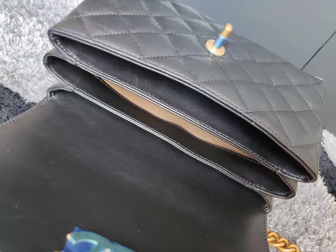 Chanel CC Trendy Top Handle Bag featuring a signature diamond quilting pattern, gold-tone CC turn-lock closure, and a structured top handle