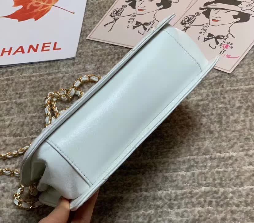 Chanel Calfskin Quilted CC Chain Accordion Tote featuring a diamond-quilted leather body and a distinctive leather-threaded gold chain Chanel CC logo on the front