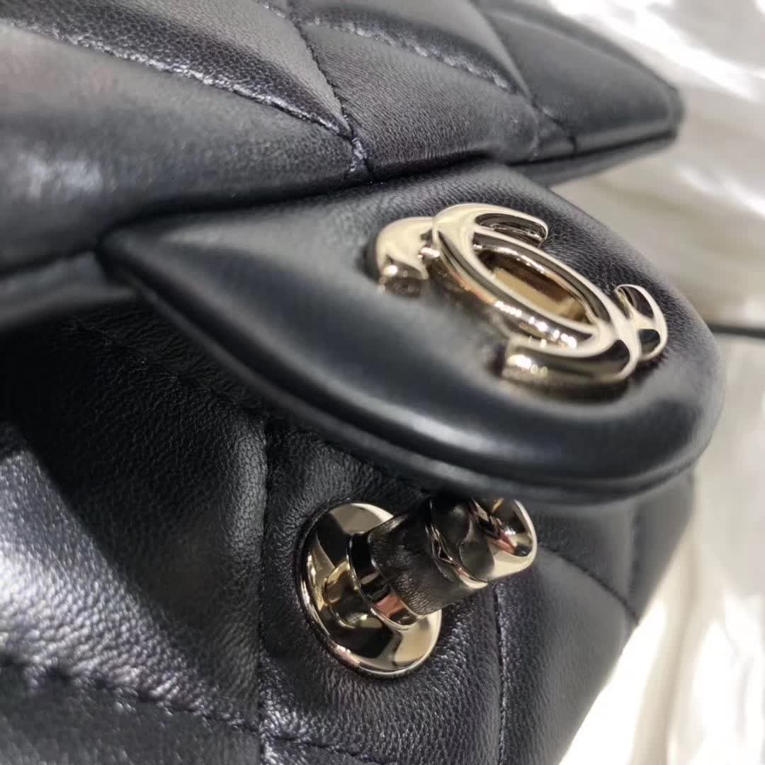 Chanel My Precious Pearls Chain Flap Bag crafted from black lambskin leather and featuring gold-toned hardware