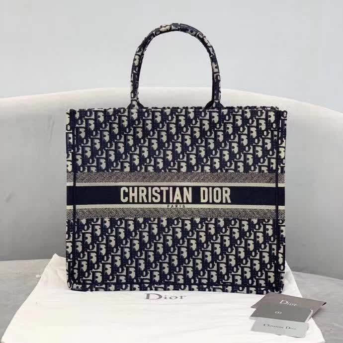 Christian Dior Book Tote in the navy blue Oblique jacquard canvas