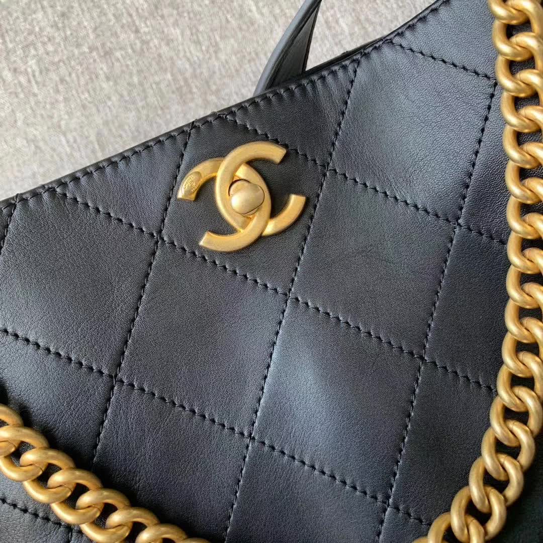 Chanel Button Up Hobo bag in quilted black calfskin leather with gold-tone hardware