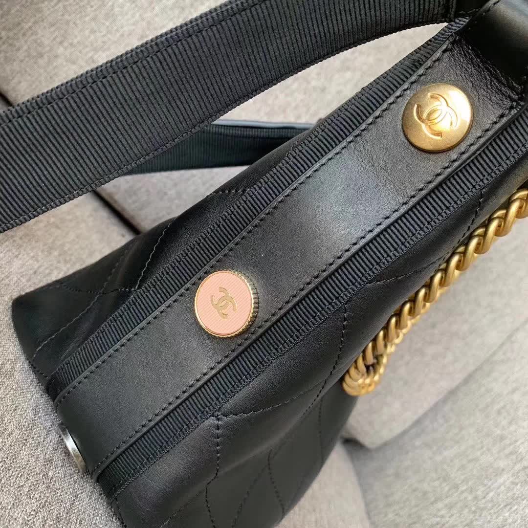 Chanel Button Up Hobo bag in quilted black calfskin leather with gold-tone hardware