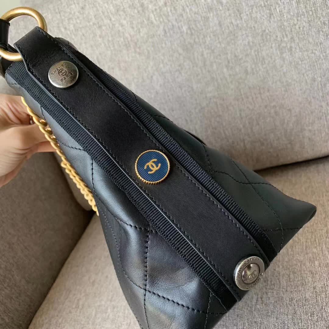 Chanel Button Up Hobo bag in quilted black calfskin leather with gold-tone hardware