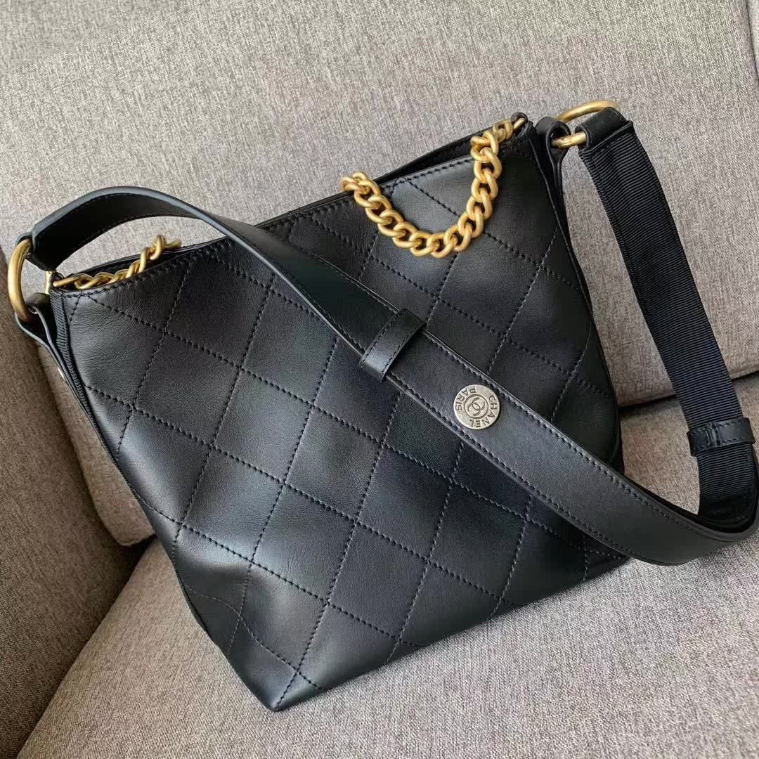 Chanel Button Up Hobo bag in quilted black calfskin leather with gold-tone hardware