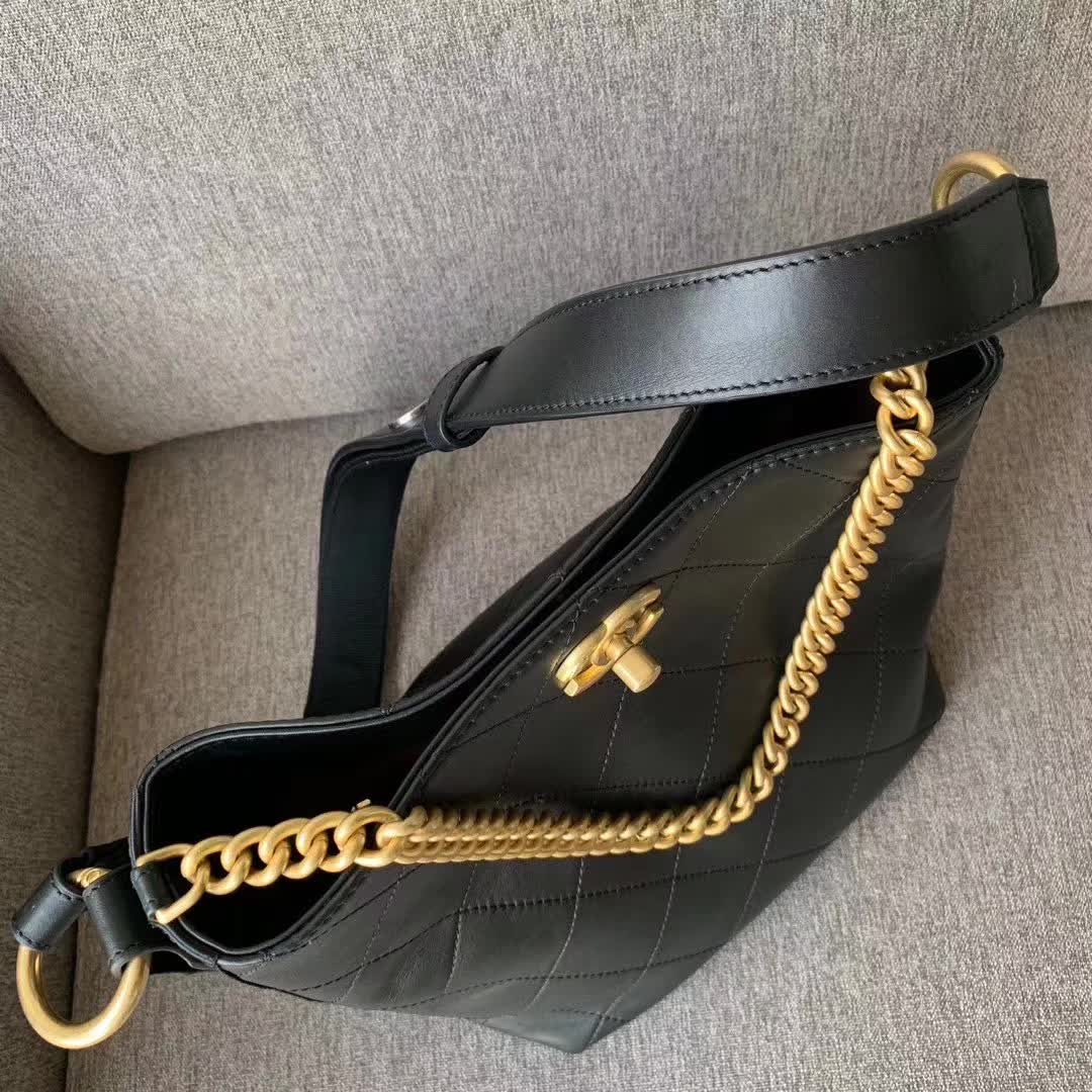 Chanel Button Up Hobo bag in quilted black calfskin leather with gold-tone hardware