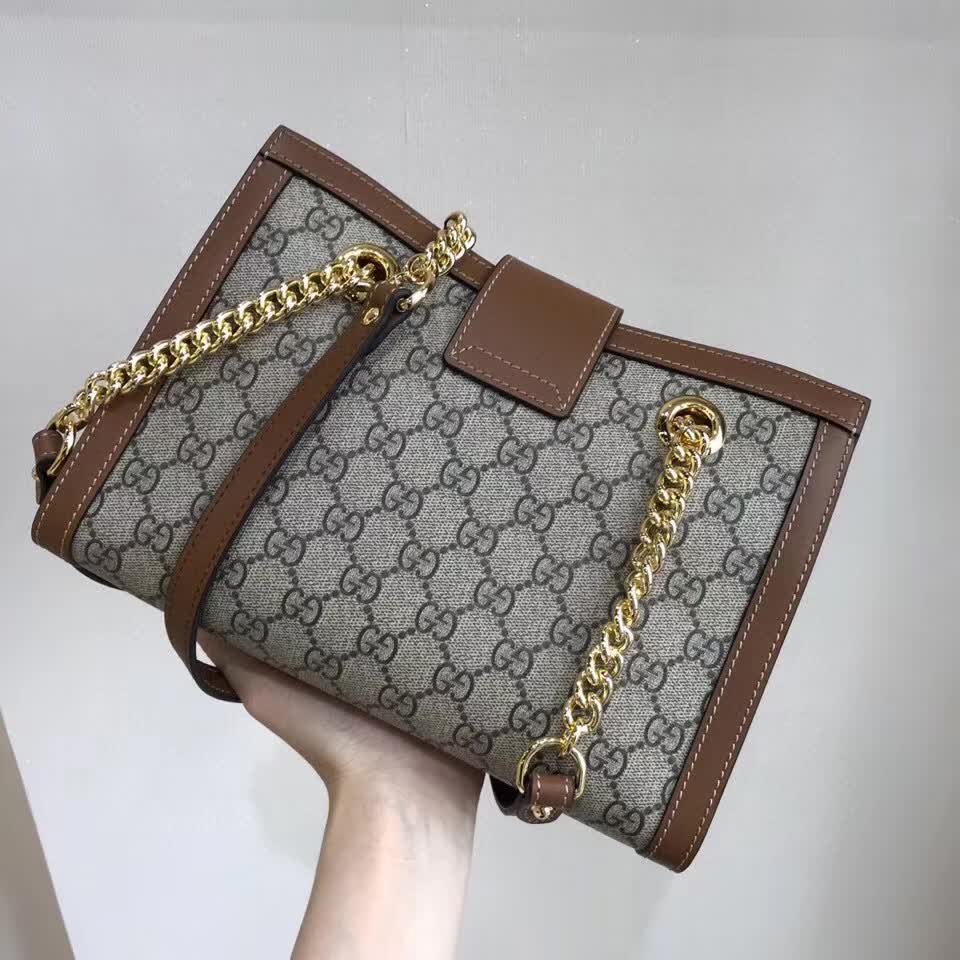 Gucci Padlock Small GG Shoulder Bag featuring GG Supreme canvas and brown leather trim