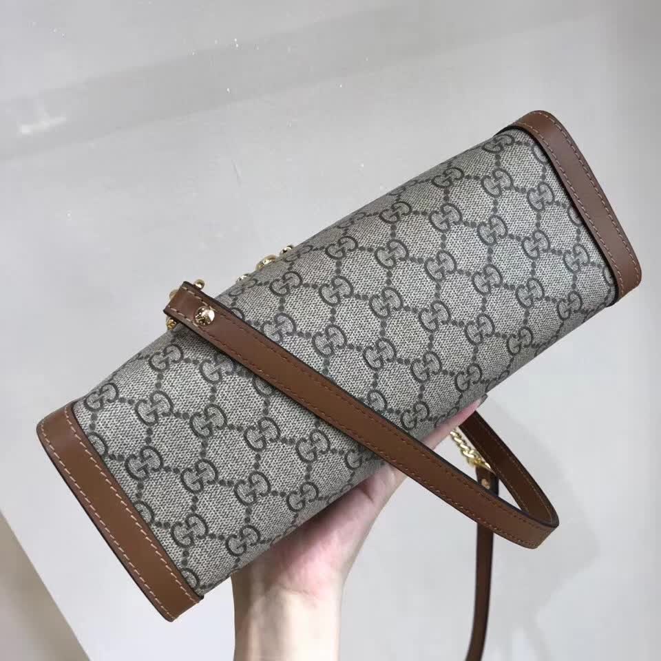 Gucci Padlock Small GG Shoulder Bag featuring GG Supreme canvas and brown leather trim