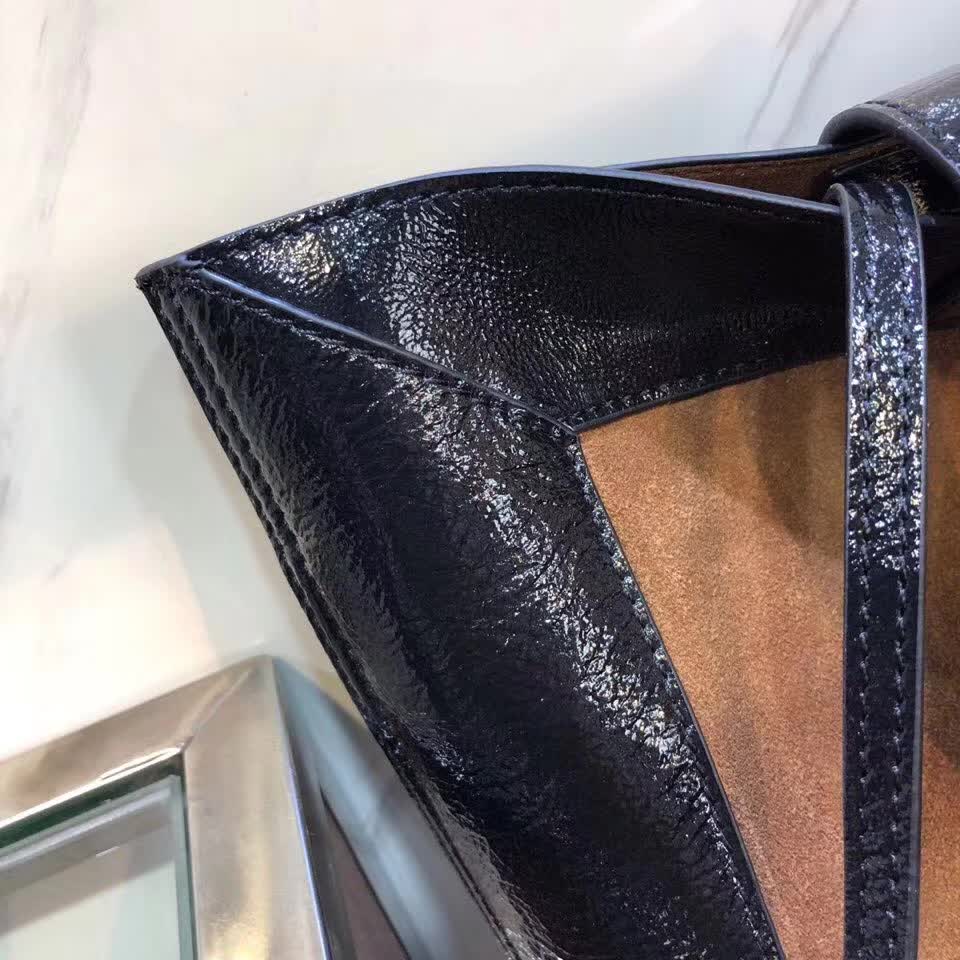 Gucci Ophidia tote bag is crafted from brown suede with black patent leather