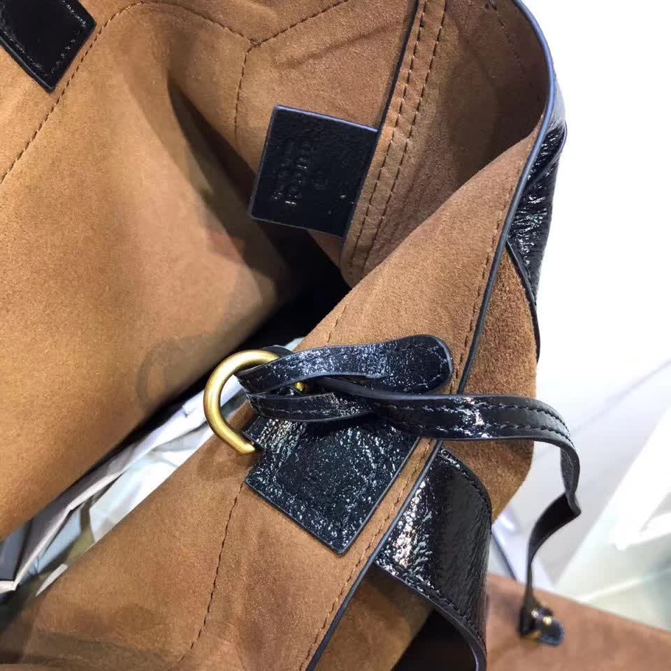 Gucci Ophidia tote bag is crafted from brown suede with black patent leather