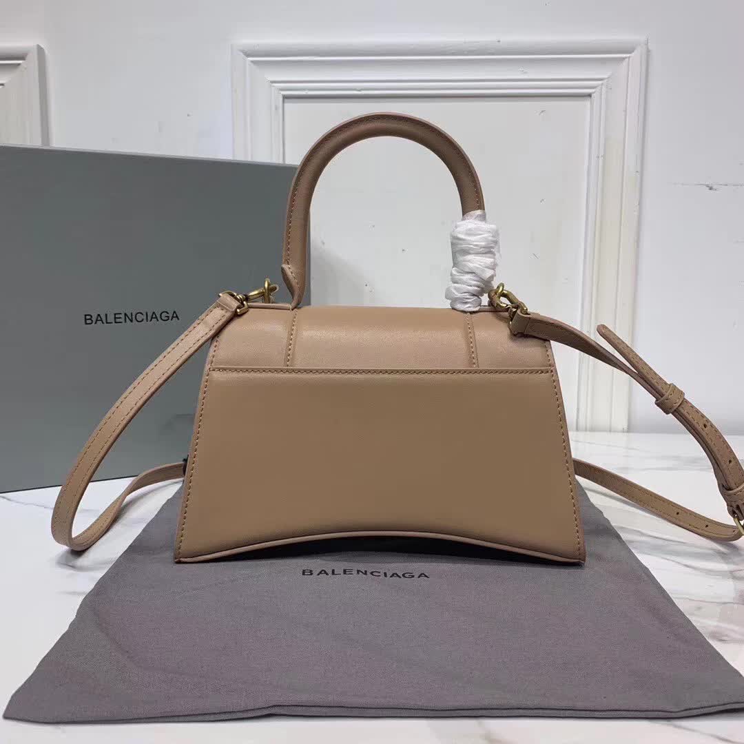 Balenciaga Hourglass small top handle bag in a brown hue