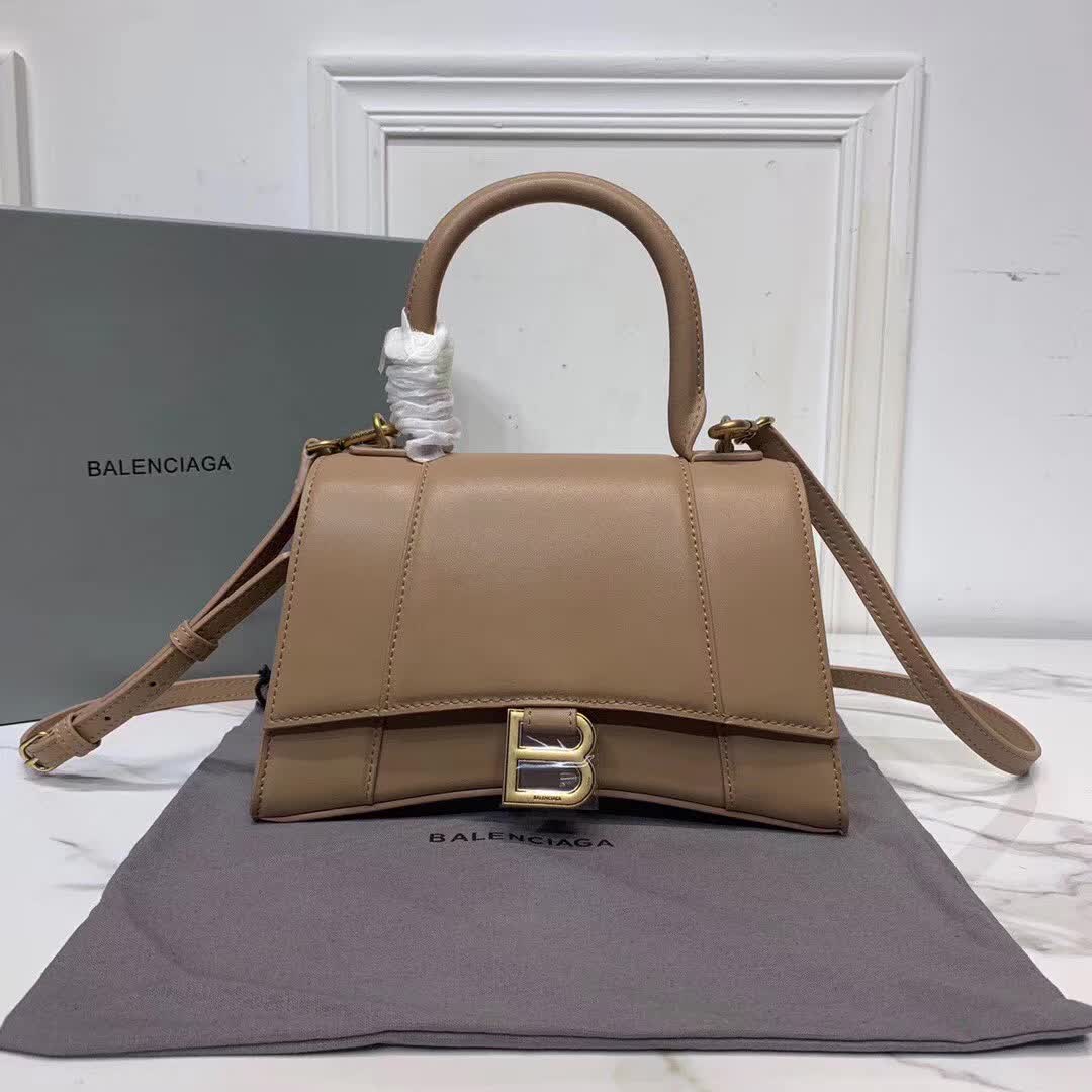 Balenciaga Hourglass small top handle bag in a brown hue