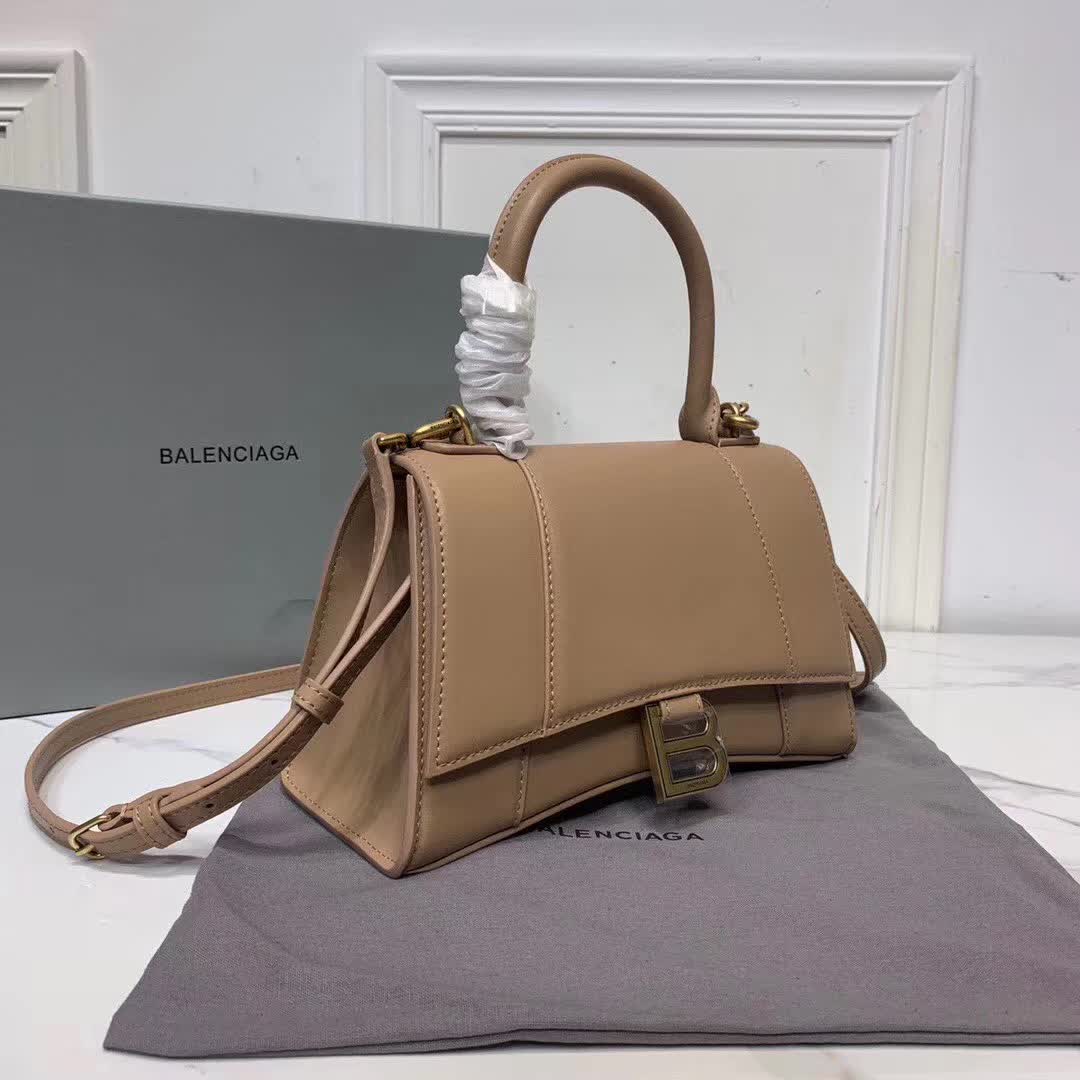 Balenciaga Hourglass small top handle bag in a brown hue
