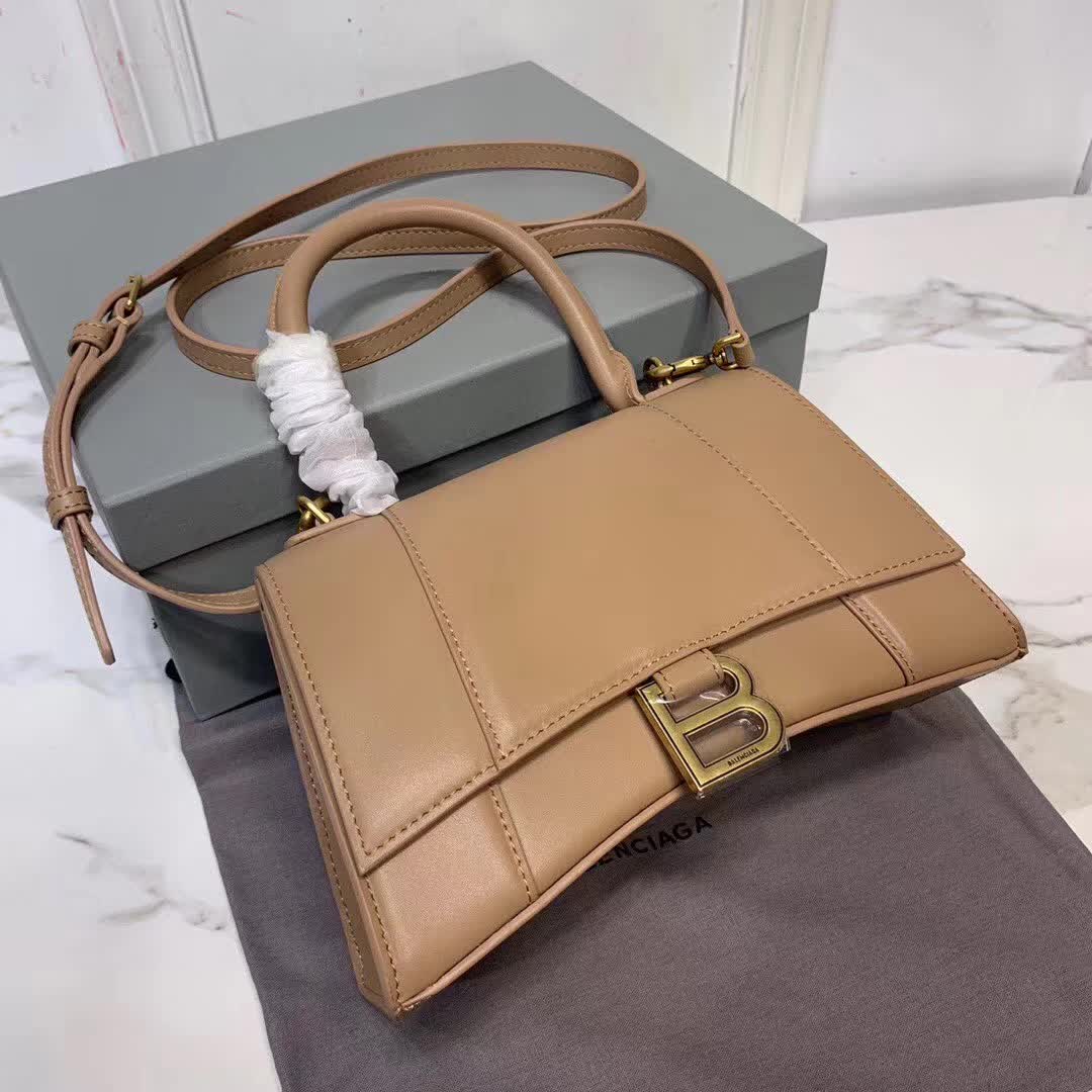 Balenciaga Hourglass small top handle bag in a brown hue