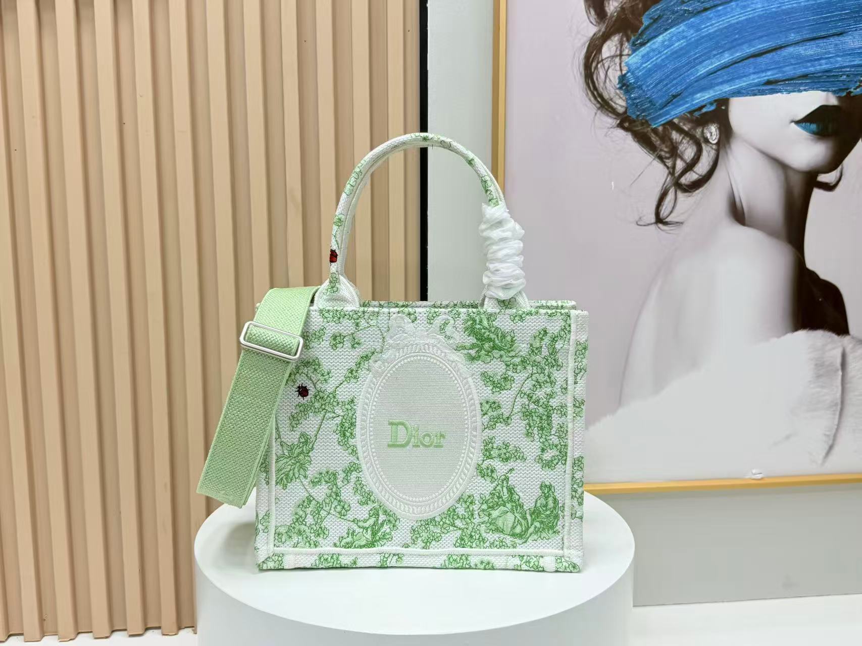 Dior Medium Book Tote with strap in green multicolor Toile de Jouy clover embroidery.